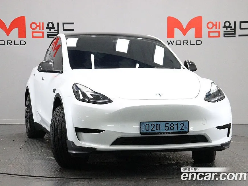 Tesla Model Y — фото 2