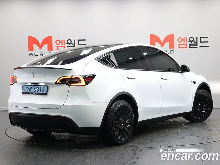Tesla Model Y — фото 3