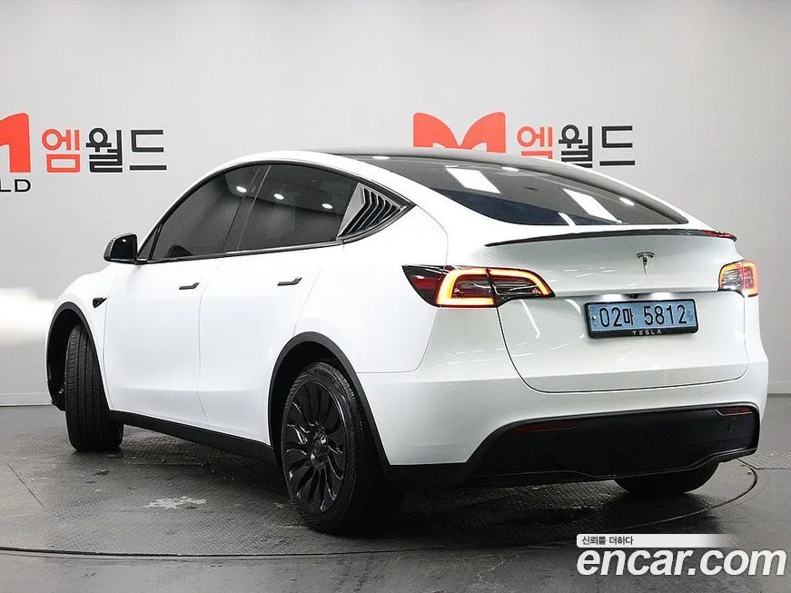 Tesla Model Y — фото 4
