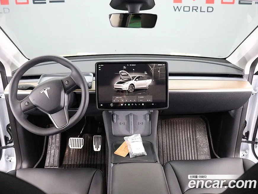 Tesla Model Y — фото 7