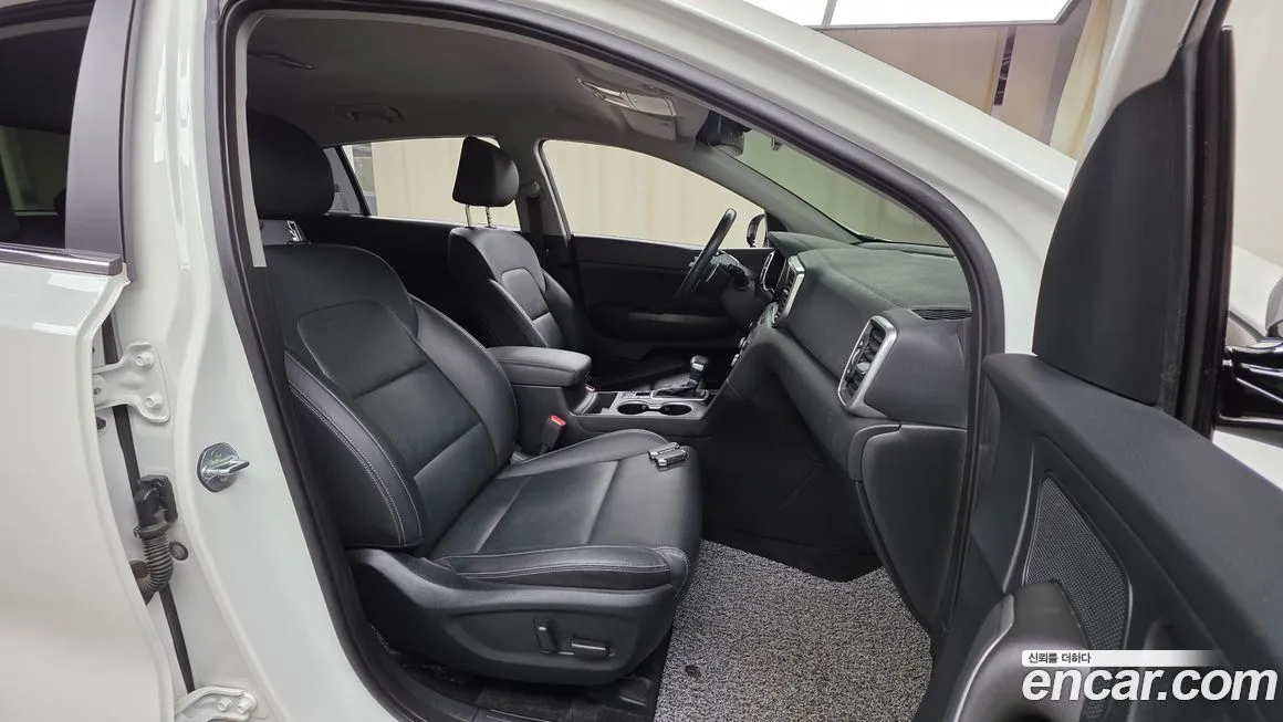 Kia Sportage — фото 10