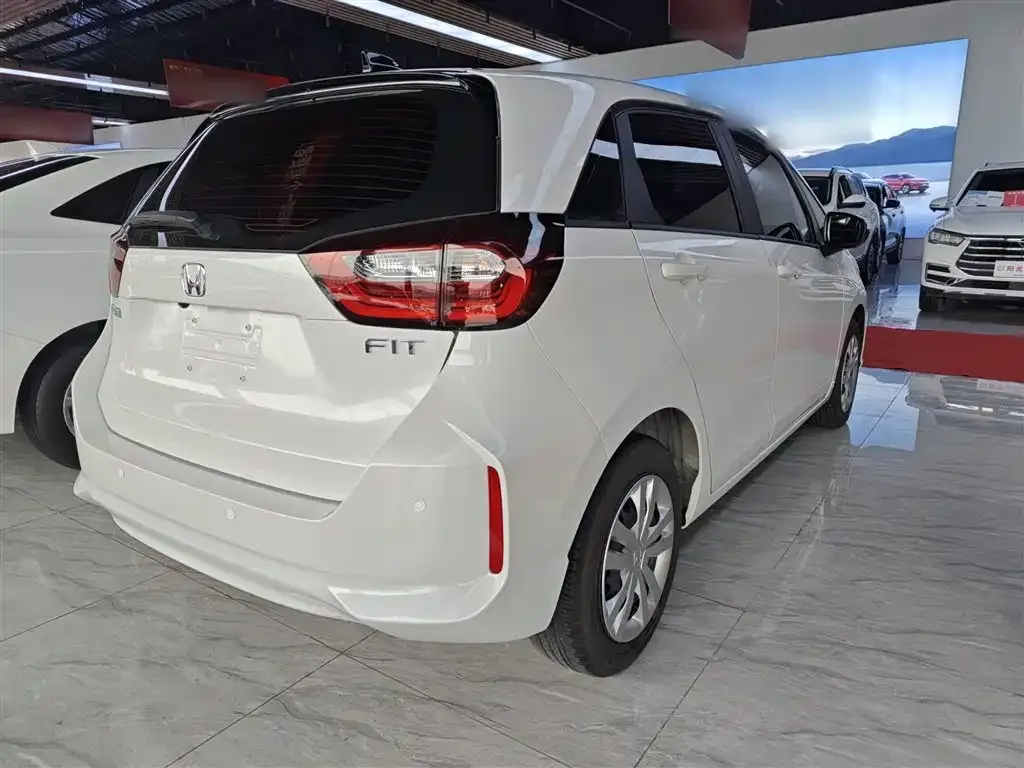 Honda Fit — фото 7