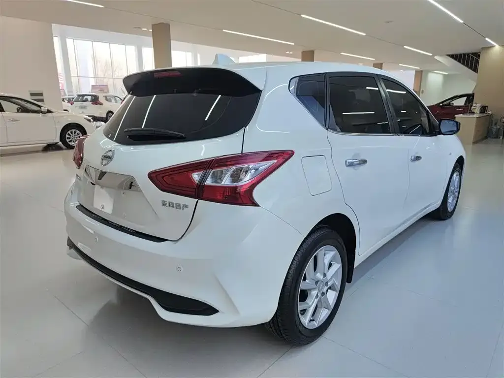 Nissan Tiida — фото 9