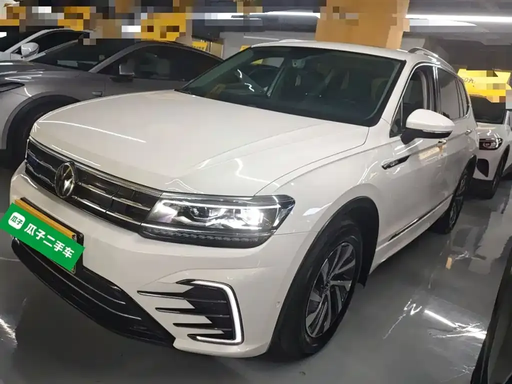 Volkswagen Tiguan L New Energy — фото 1