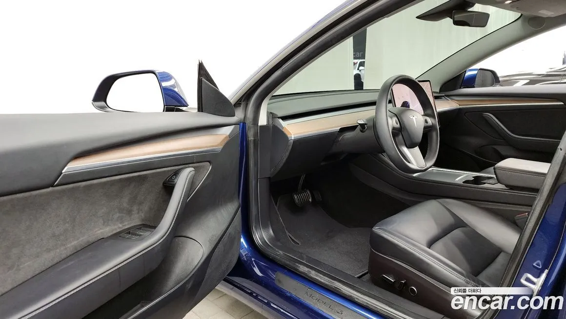 Tesla Model 3 — фото 10