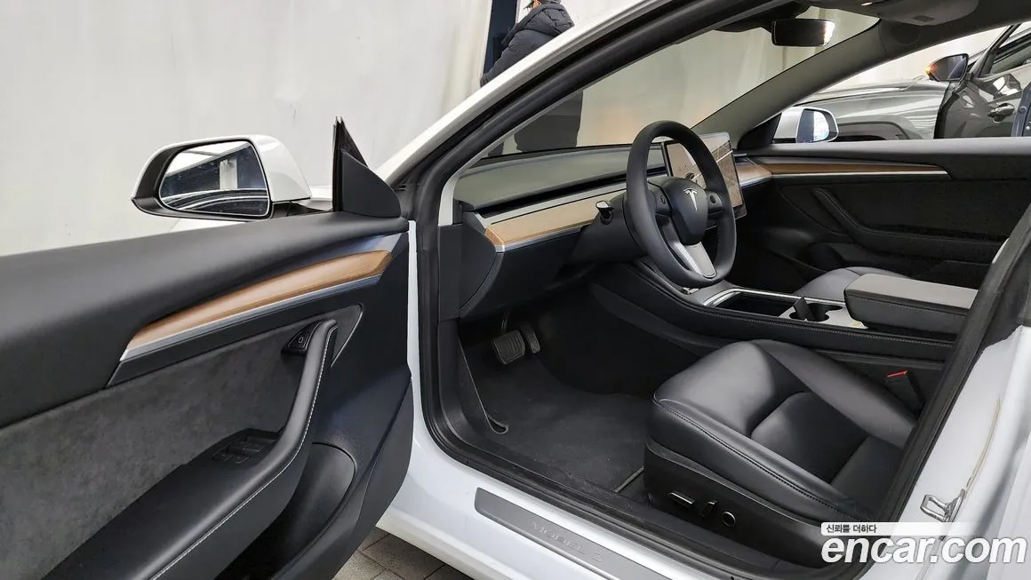 Tesla Model 3 — фото 9