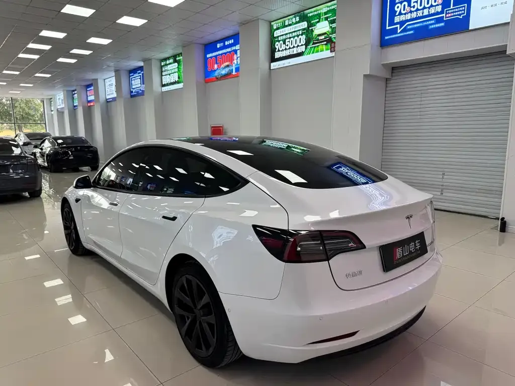 Tesla Model 3 — фото 8