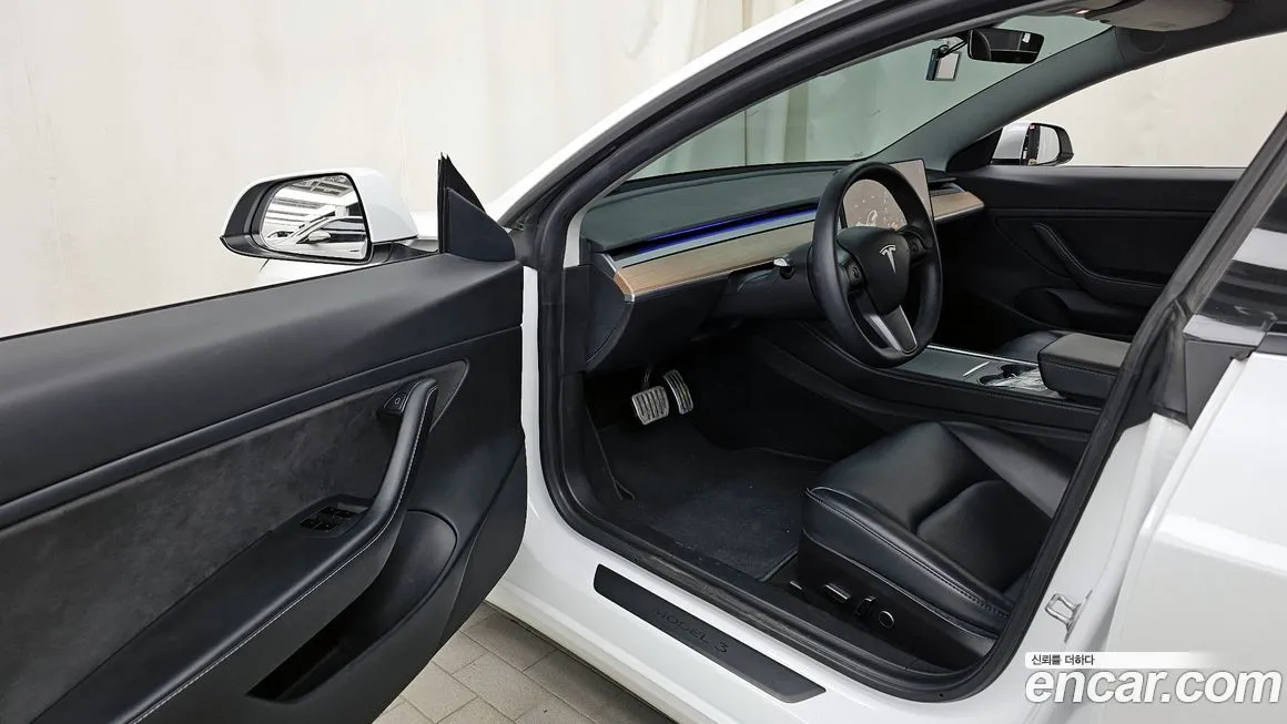 Tesla Model 3 — фото 9