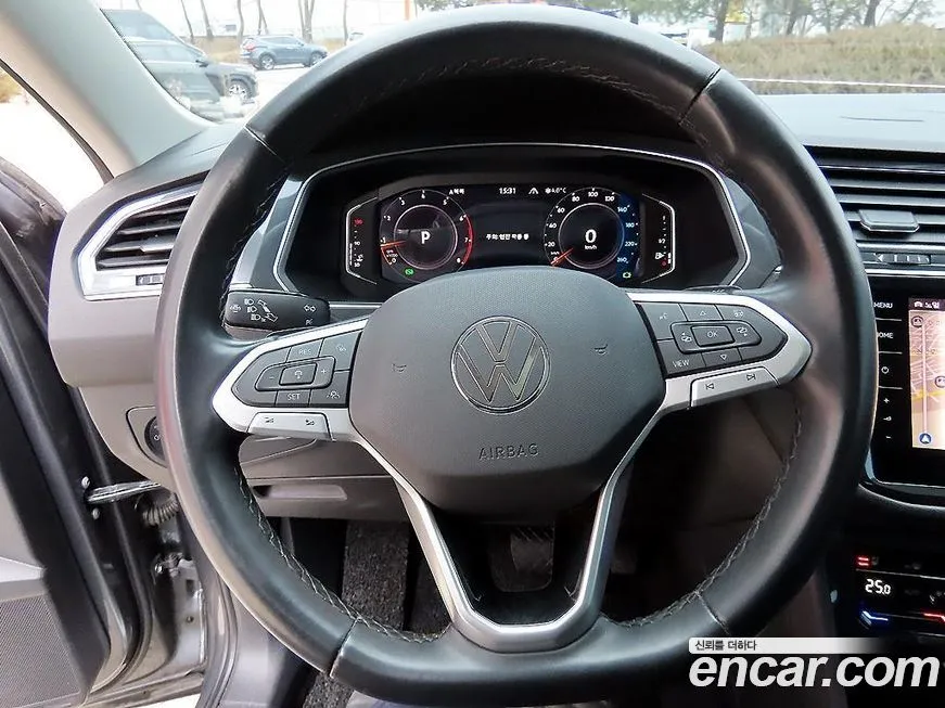 Volkswagen Tiguan — фото 7