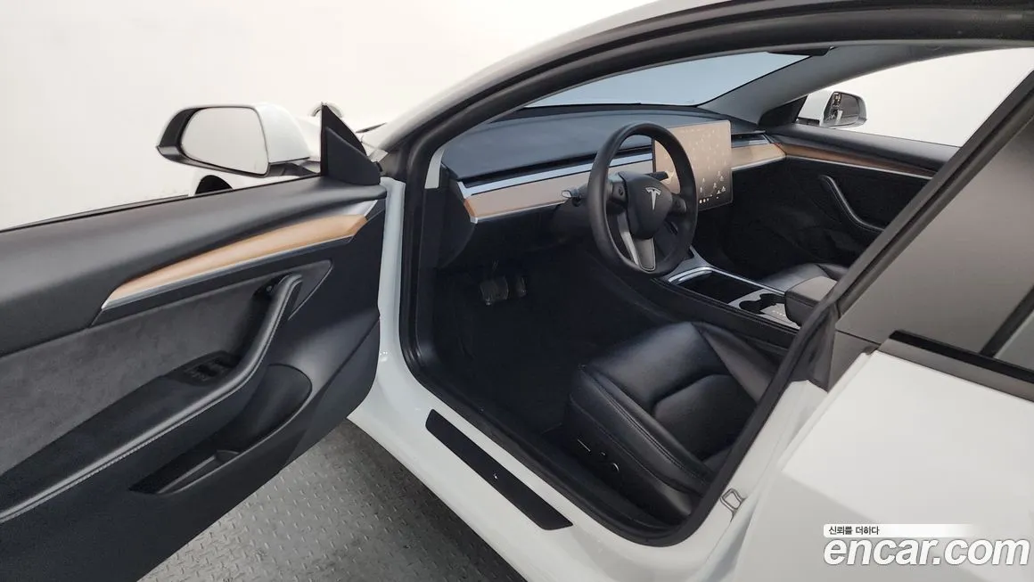Tesla Model 3 — фото 6
