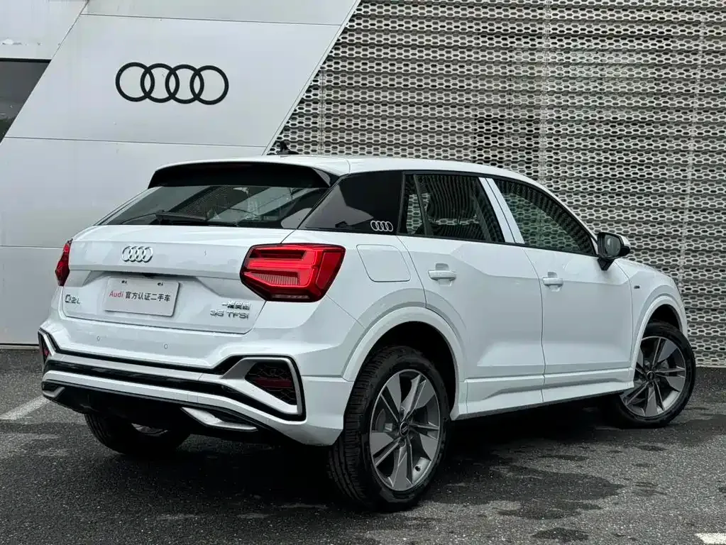 Audi Q2L — фото 7