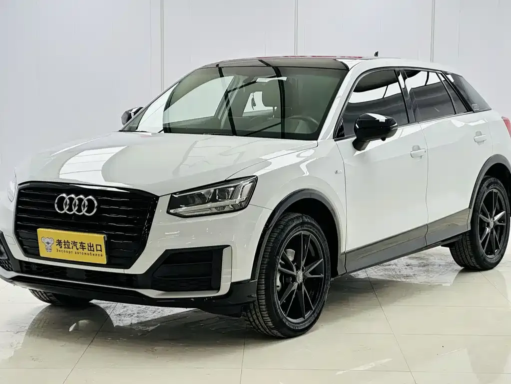 Audi Q2L — фото 2