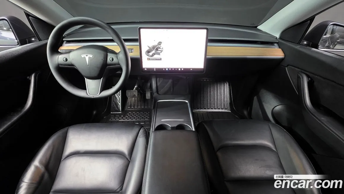 Tesla Model Y — фото 10