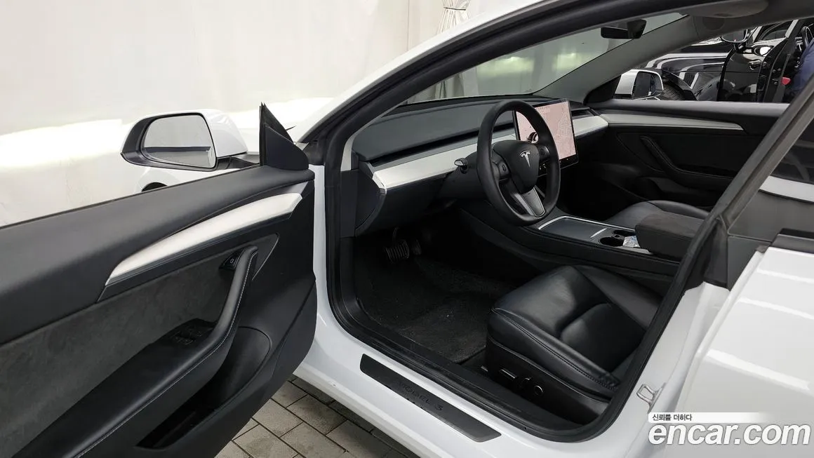 Tesla Model 3 — фото 6