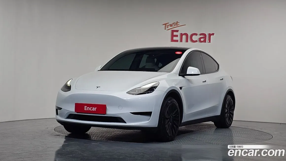 Tesla Model Y — фото 1