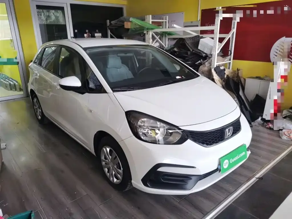 Honda Fit — фото 8