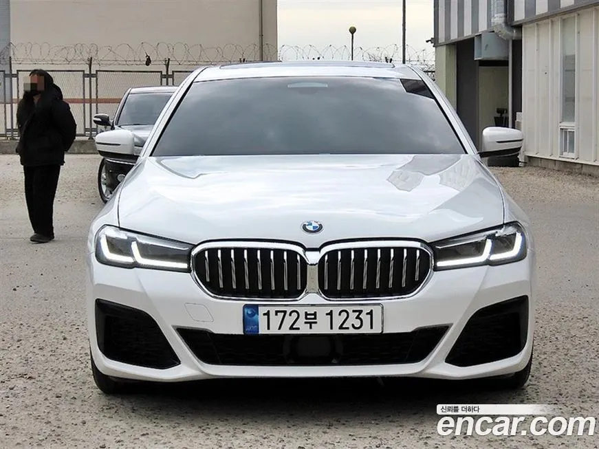 BMW 5-Series — фото 1