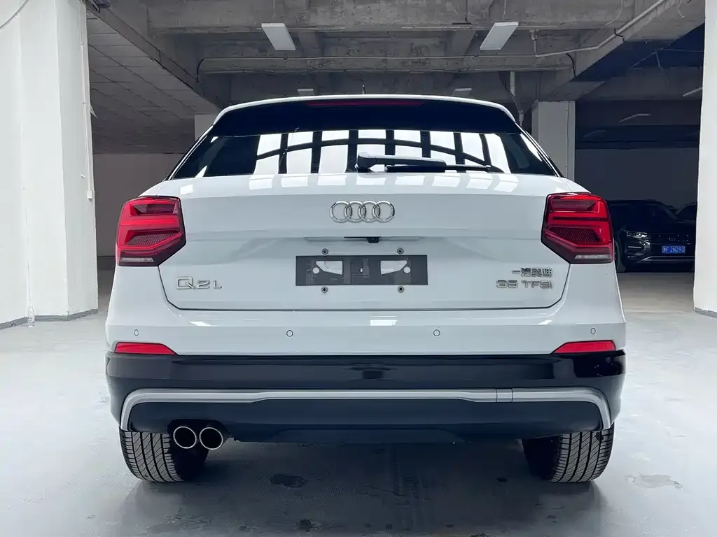 Audi Q2L — фото 6