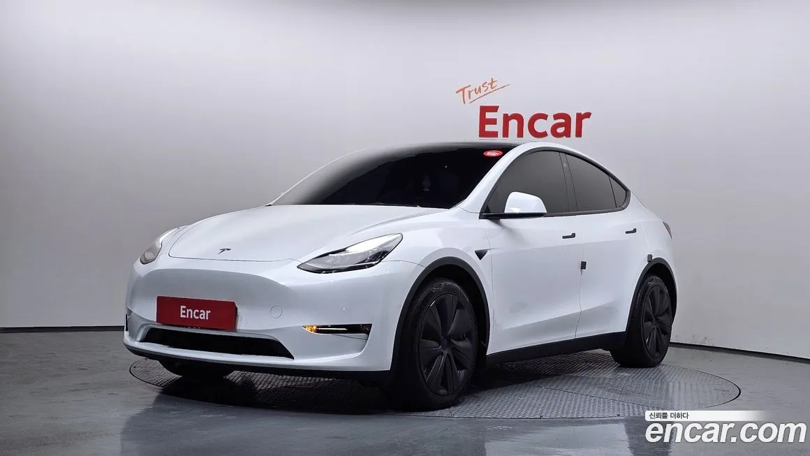 Tesla Model Y — фото 1