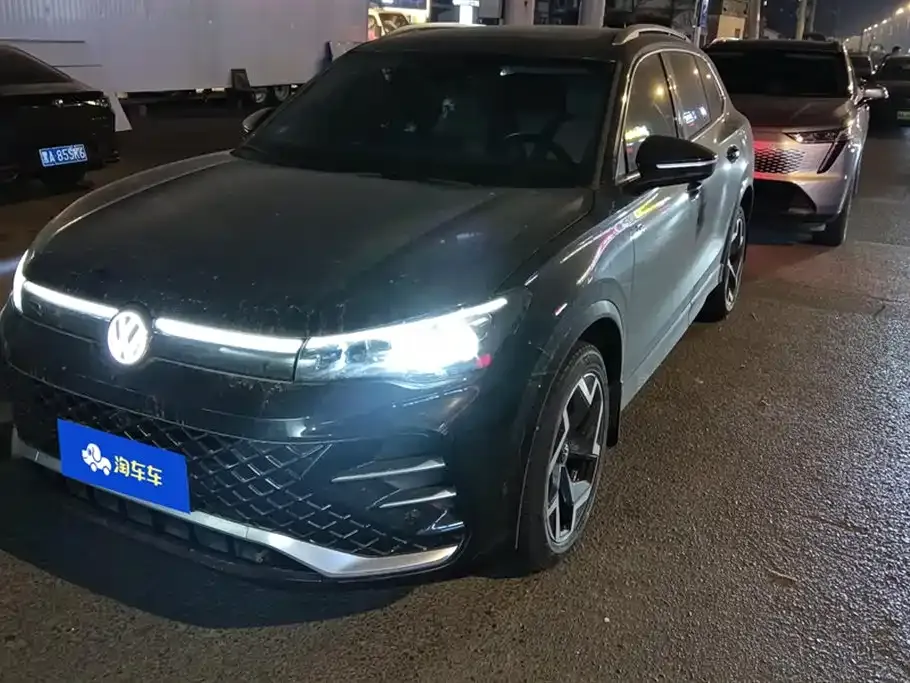 Volkswagen Tiguan L — фото 1