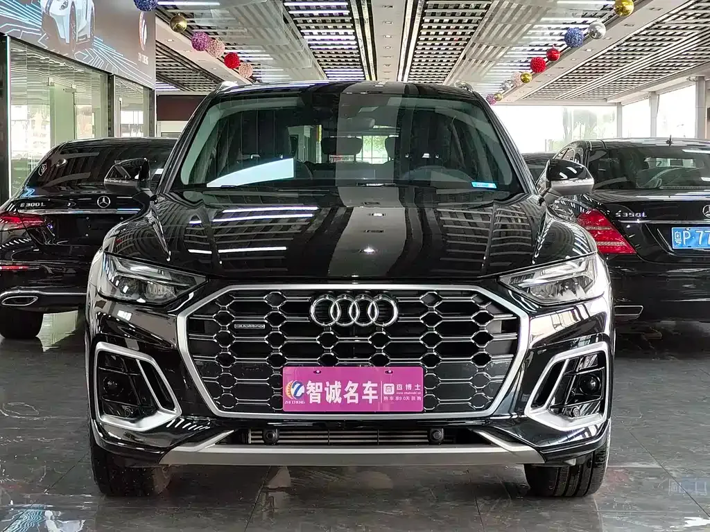 Audi Q5L — фото 10