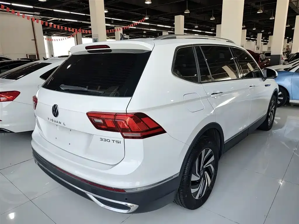 Volkswagen Tiguan L — фото 7