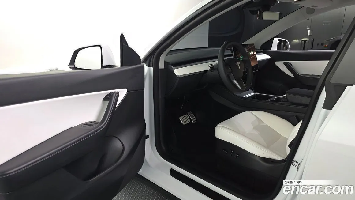 Tesla Model Y — фото 8