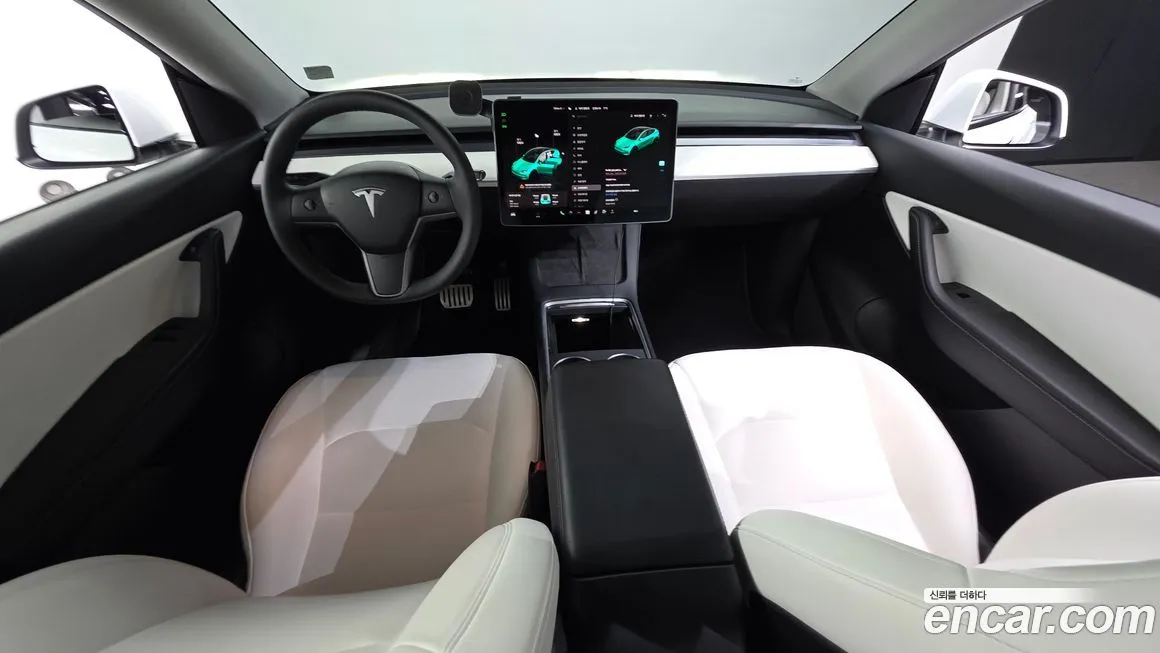 Tesla Model Y — фото 10