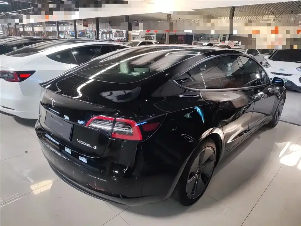 Tesla Model 3 — фото 9