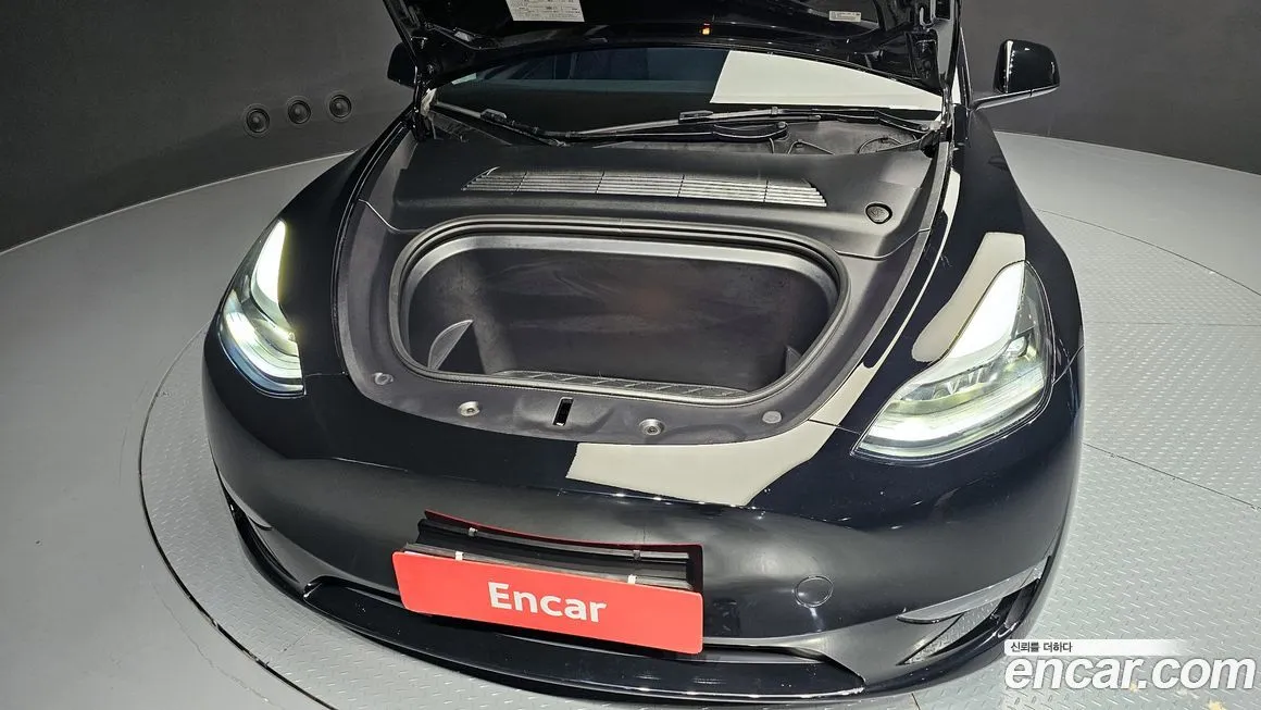 Tesla Model Y — фото 10