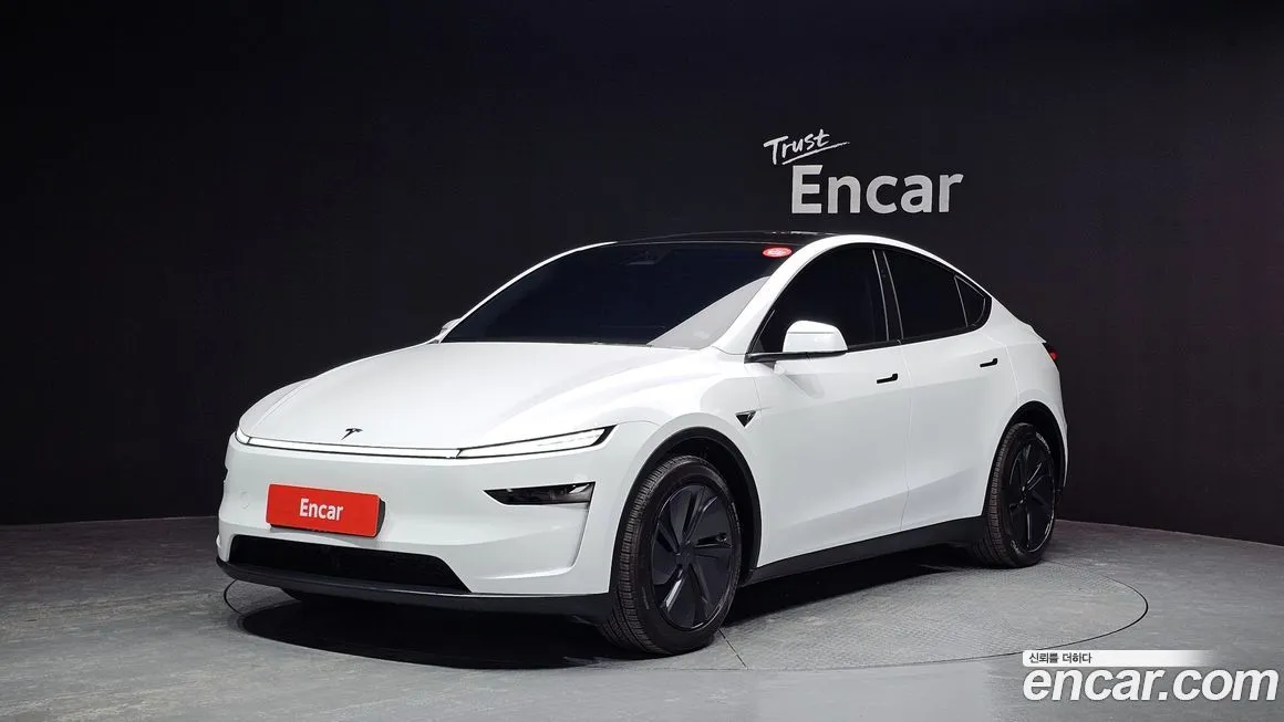 Tesla Model Y — фото 1