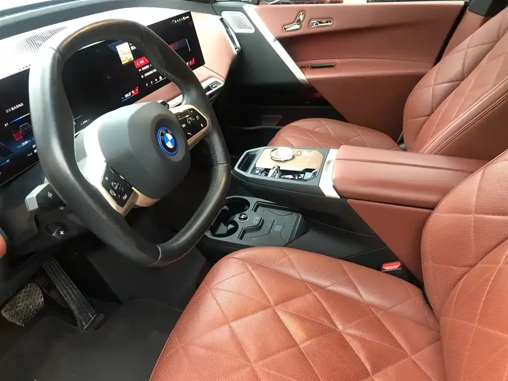 BMW iX M60 — фото 10