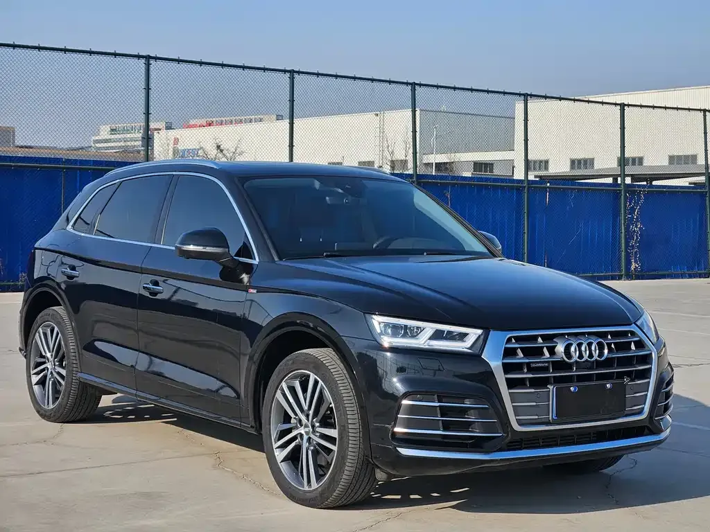 Audi Q5L — фото 10