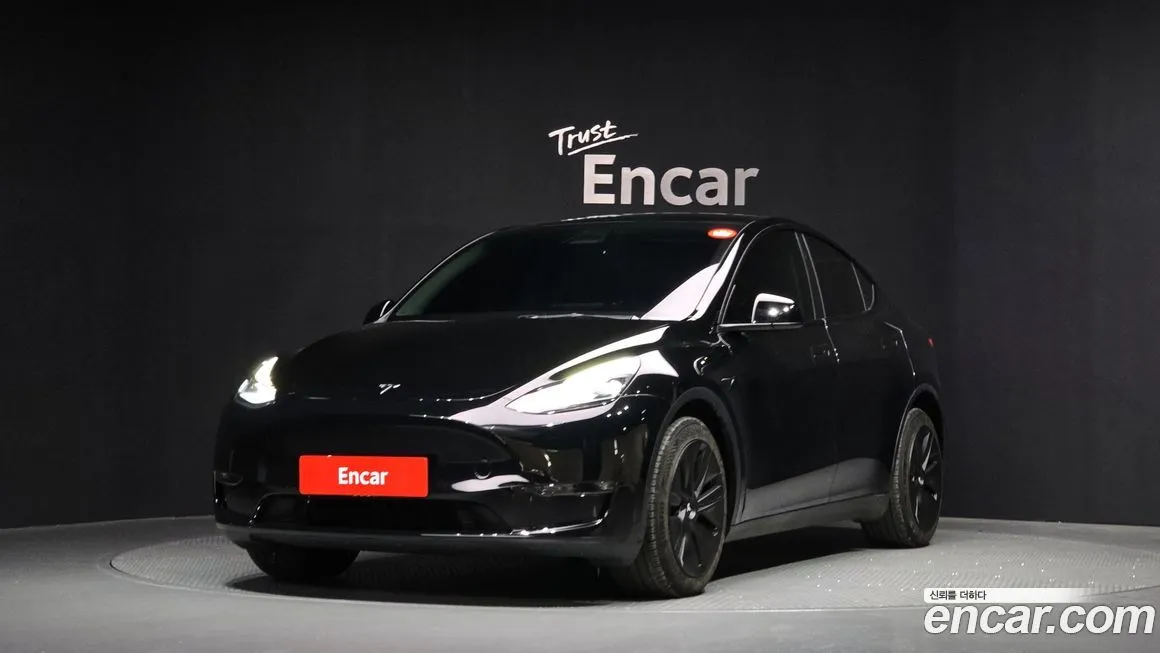 Tesla Model Y — фото 1