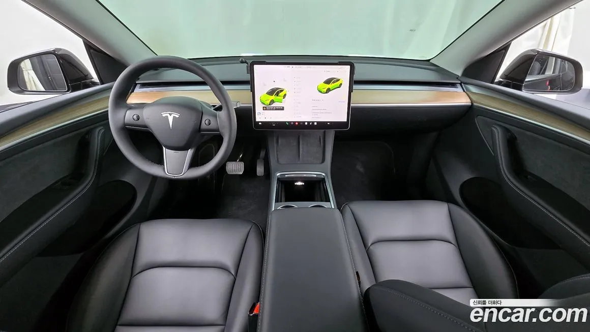 Tesla Model Y — фото 10