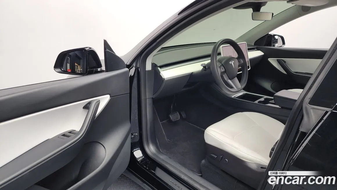 Tesla Model Y — фото 6