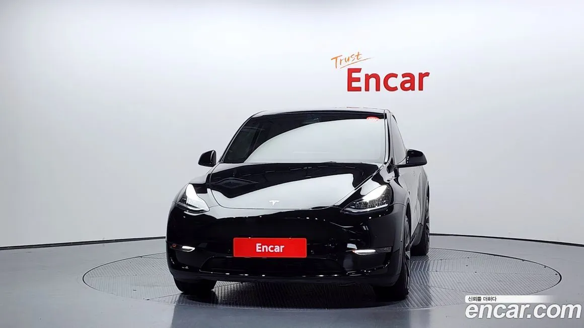 Tesla Model Y — фото 10