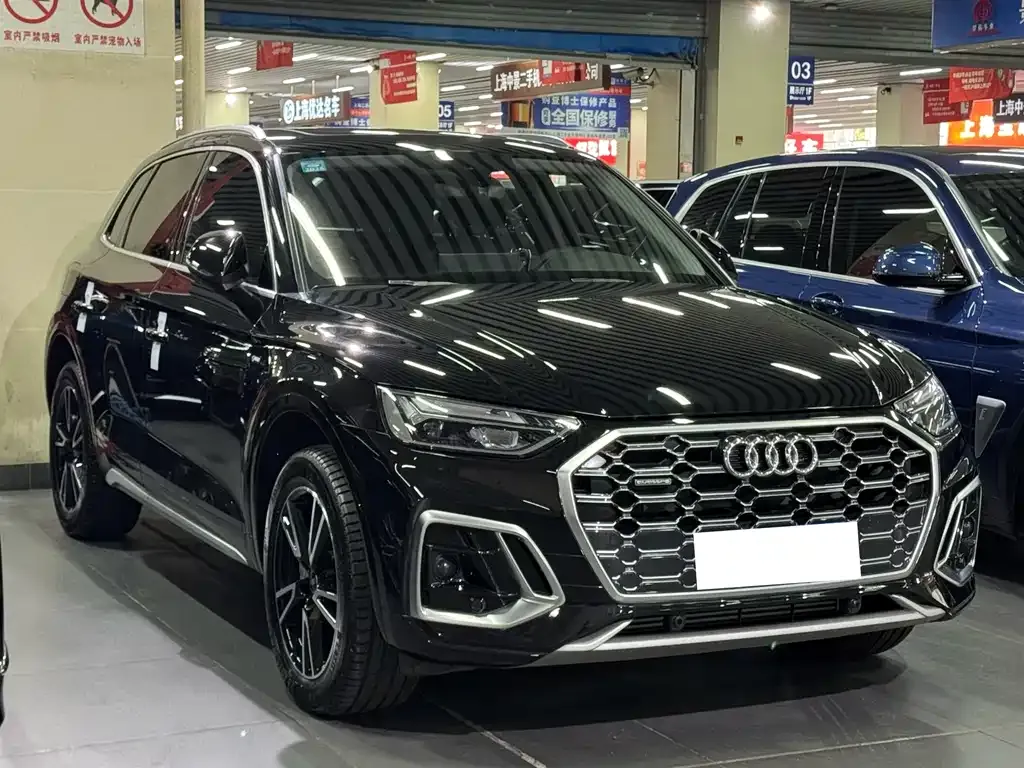 Audi Q5L — фото 5