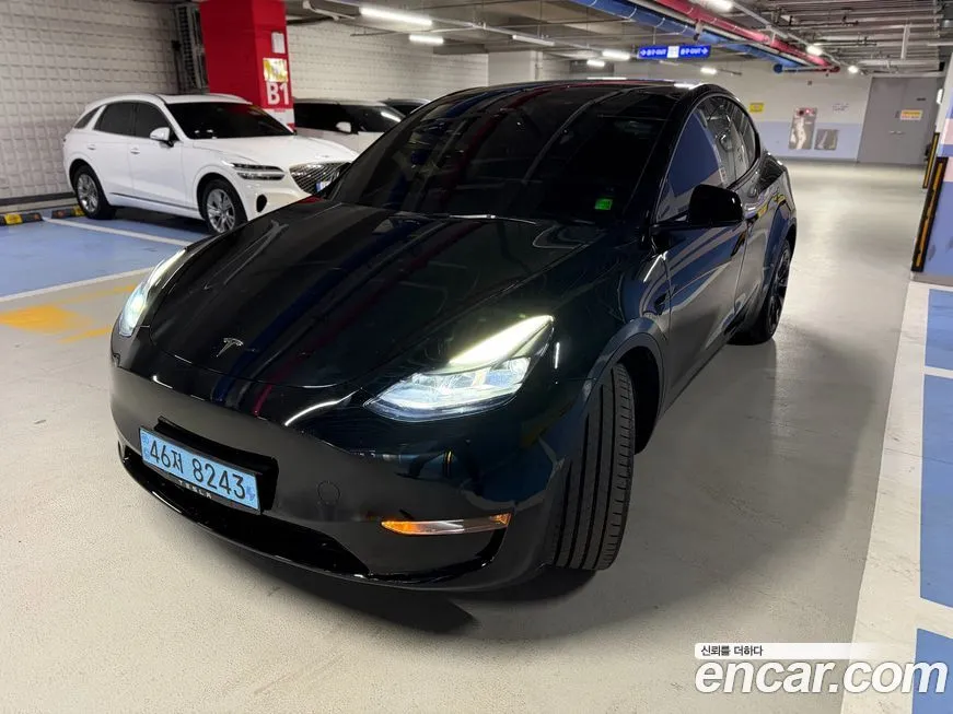 Tesla Model Y — фото 1