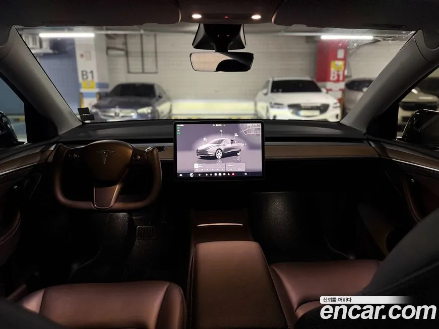 Tesla Model Y — фото 10