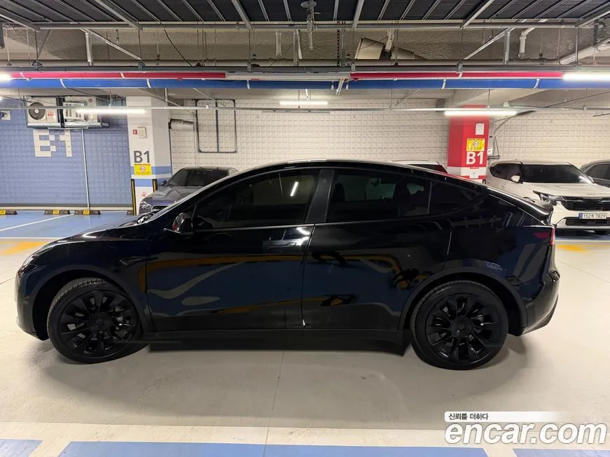 Tesla Model Y — фото 8