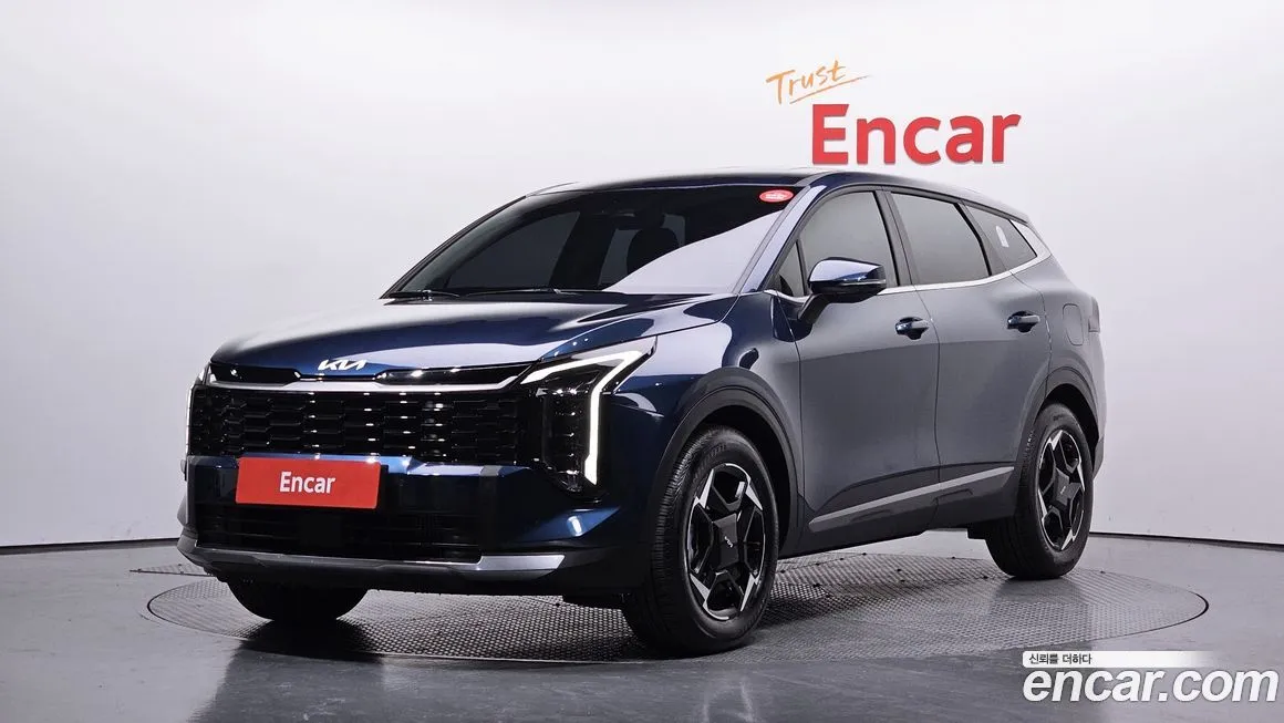 Kia Sportage — фото 1