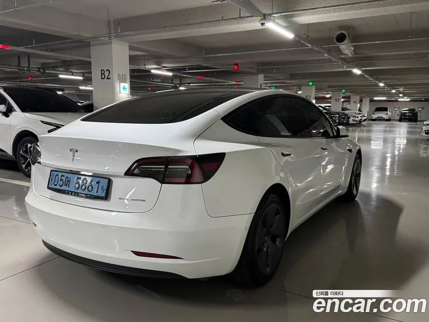 Tesla Model 3 — фото 10