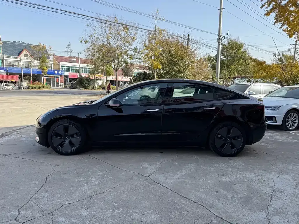 Tesla Model 3 — фото 6