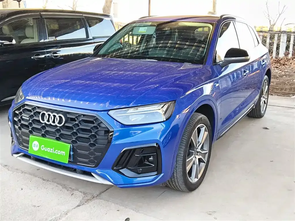 Audi Q5L — фото 5