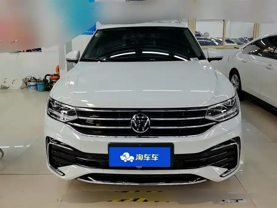 Volkswagen Tiguan L — фото 2