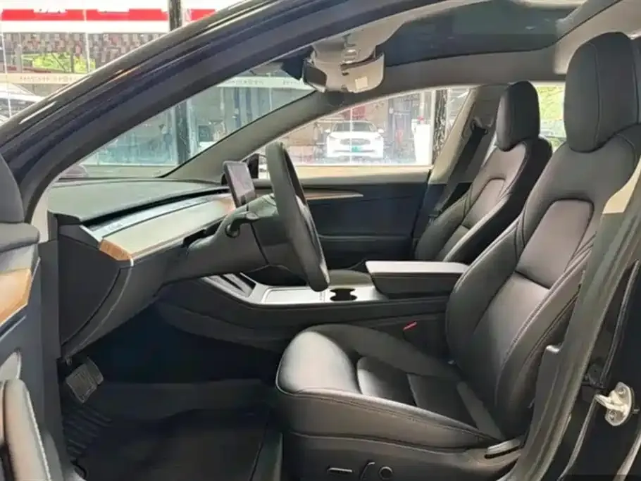 Tesla Model 3 — фото 10