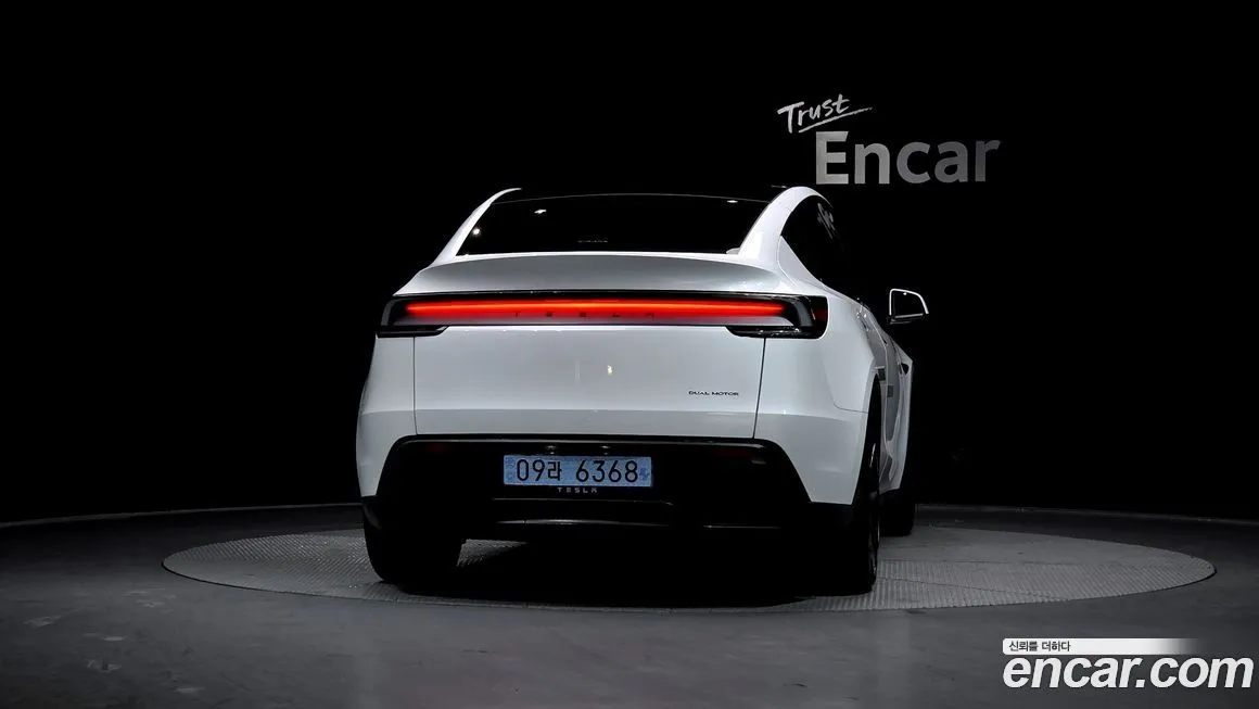 Tesla Model Y — фото 7