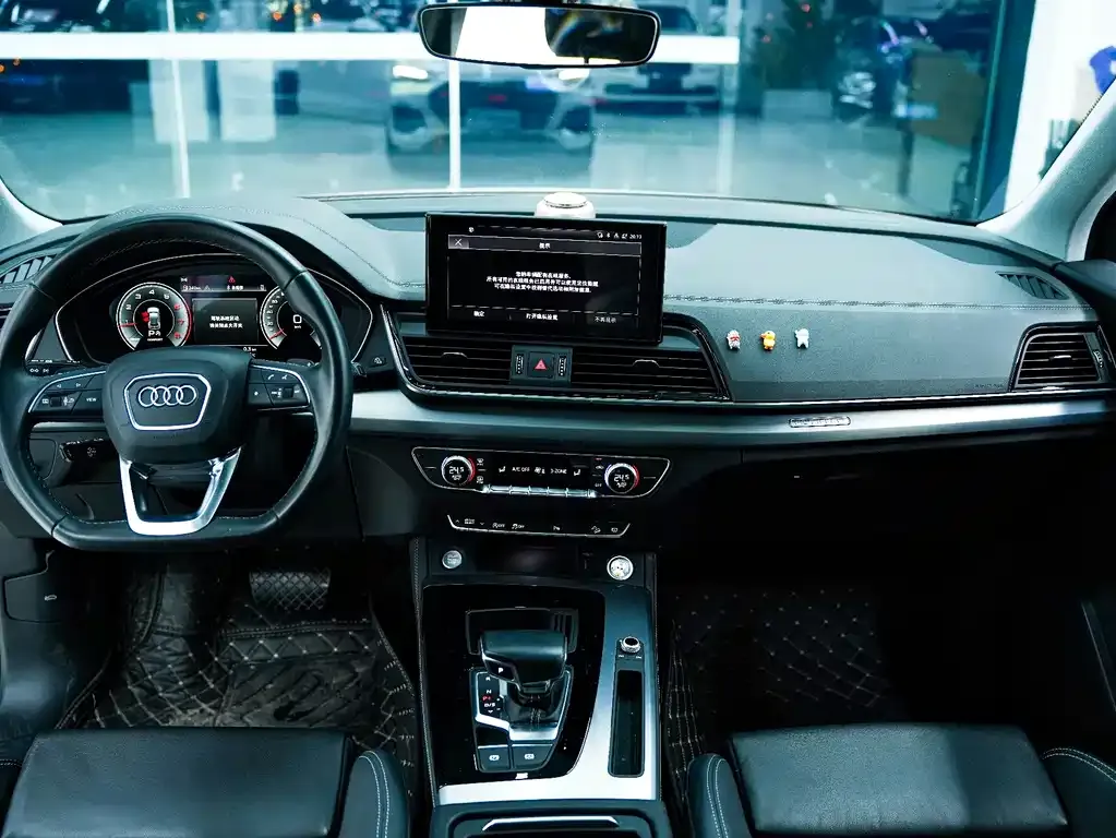 Audi Q5L — фото 9