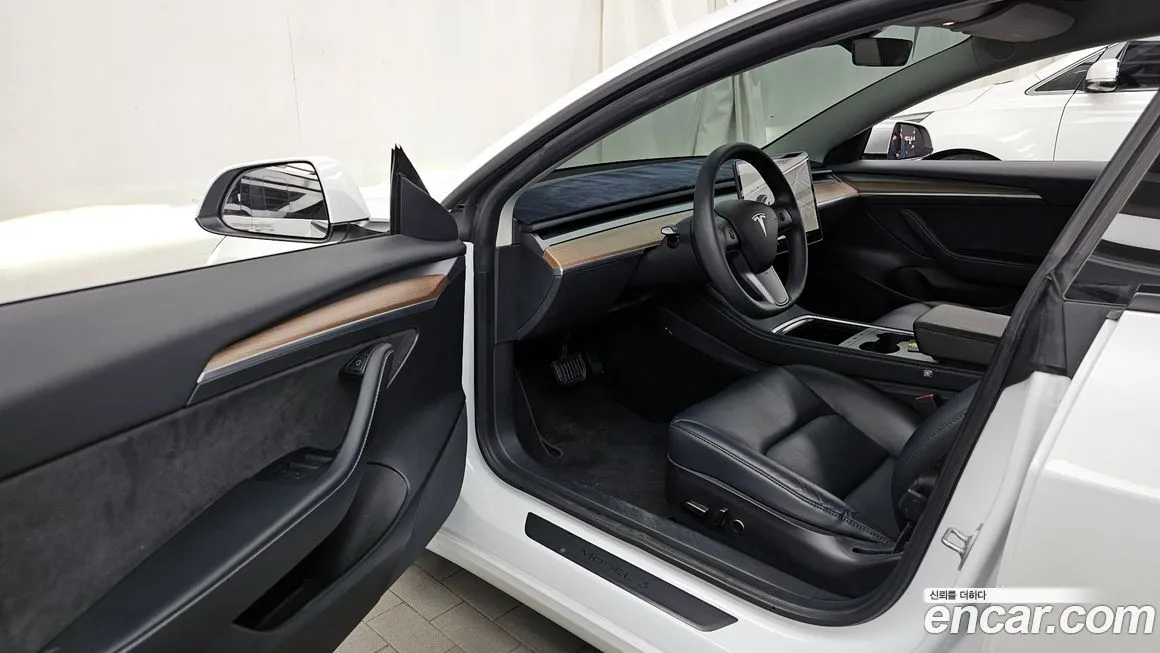 Tesla Model 3 — фото 10